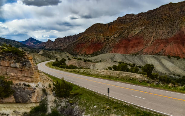 istock Road among red layered rocks in Utah, US 2026407788