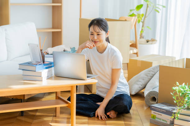 istock young woman packing 2026455823