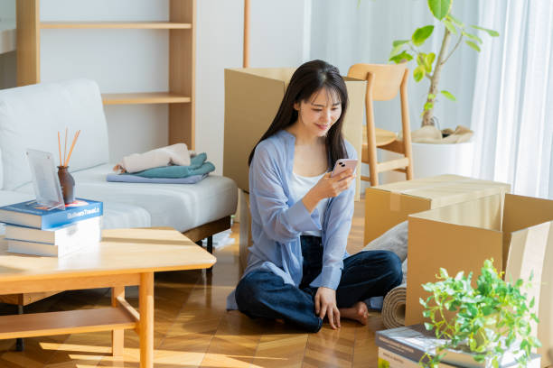 istock young woman packing 2026455824