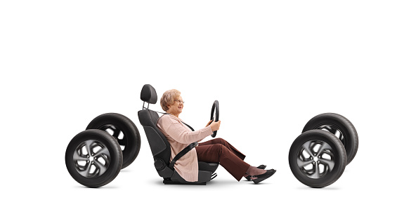 Elderly woman driver, car seat and four tires isolated on white background