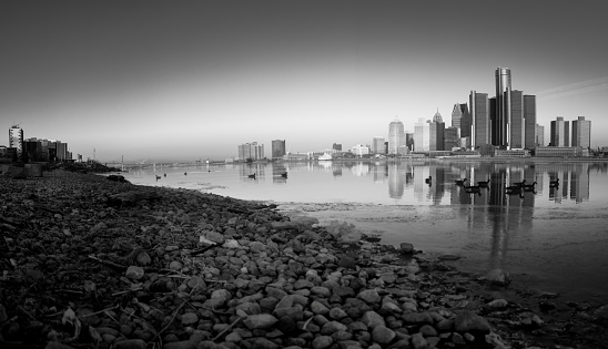 The Detroit skyline during dawn as seen from across the Detroit River, in Windsor, Ontario, Canada.