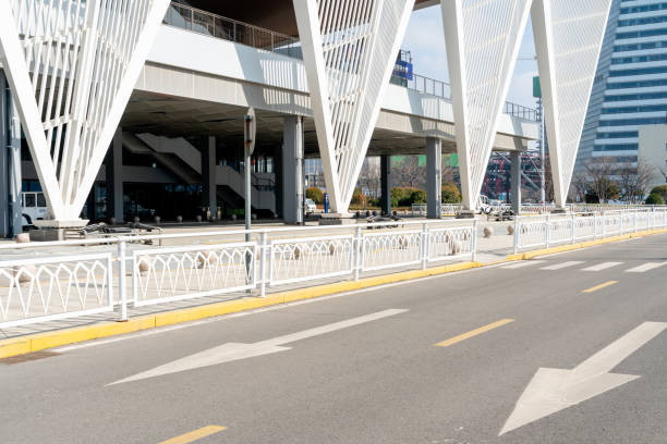 empty asphalt road in downtown of modern city during daytime. copy space for parking lot. Location: Qingdao, china, gangzhou RD,  36.084468, 120.317270