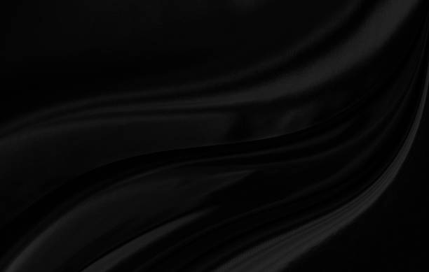 istock Black gray satin dark fabric texture luxurious shiny that is abstract silk cloth background with patterns soft waves blur beautiful. 2026930045