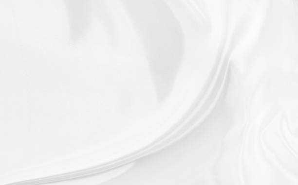istock White gray satin texture that is white silver fabric silk background with beautiful soft blur pattern natural. 2026931598