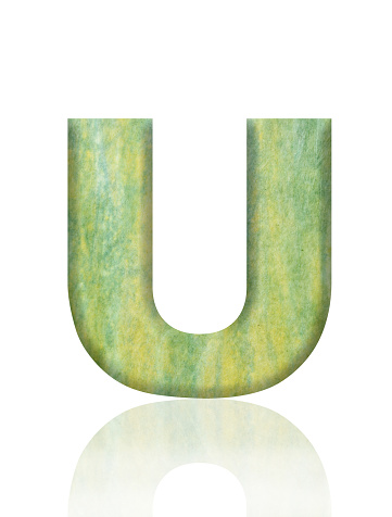 Close-up of three-dimensional Washi paper alphabet letter U on white background.