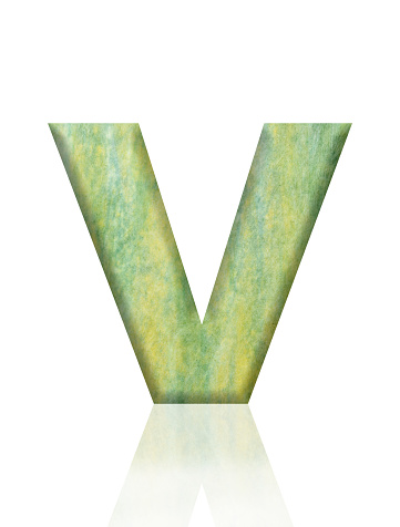 Close-up of three-dimensional Washi paper alphabet letter V on white background.