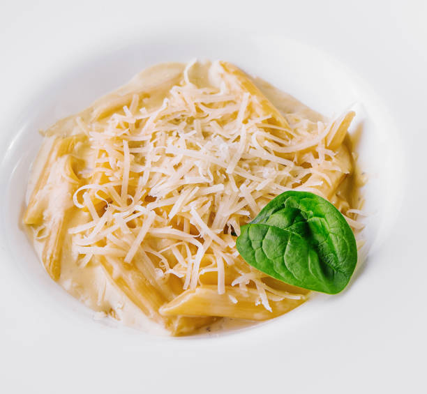istock penne pasta with parmesan and rice with parmesan 2027038565