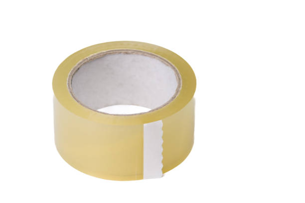 istock Adhesive packing tape transparent, one roll isolated on white background 2027083081