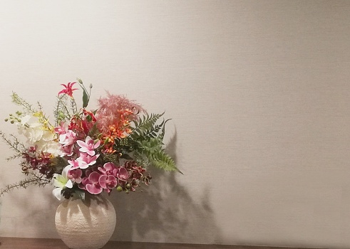 Flowers in vases and walls, with space for photocopying