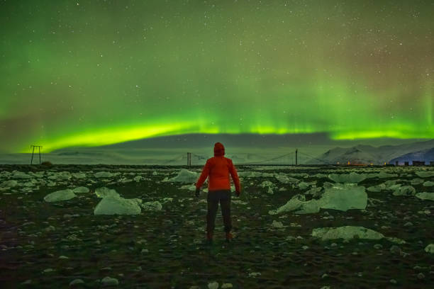istock solo traveler. Aurora Borealis in Iceland 2027108938