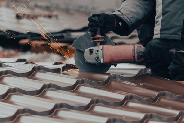 istock A worker cuts metal with a grinder at a construction site 2027109965