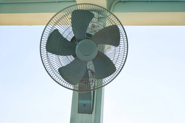 istock Picture of a ceiling fan installed in a dining room for cooling. 2027121061