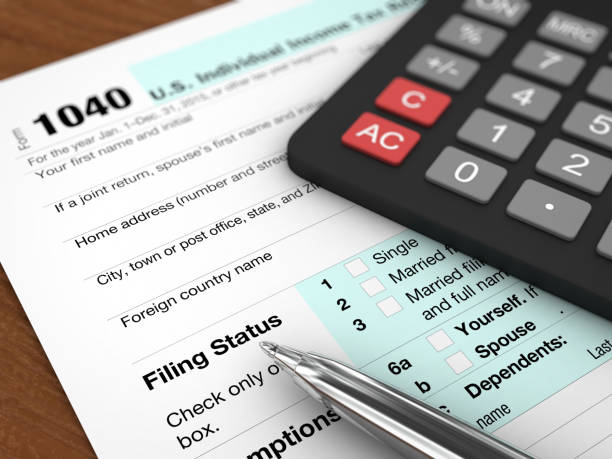 istock Tax form calculator payment planning audit business 2027121153