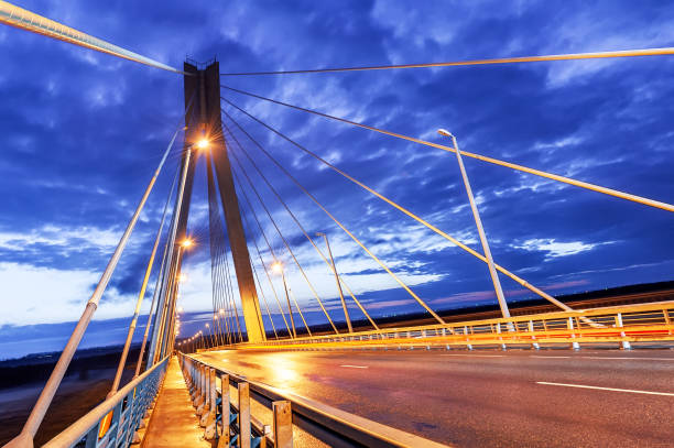 istock Cable-stayed bridge at sunset against a beautiful sky and in the rays of evening lighting. Moore. Russia. 2027126569