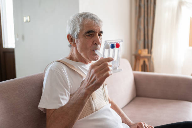 istock Breathing Exercises With Spirometer At Home 2027136592