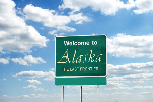 Alaska  welcome road sign