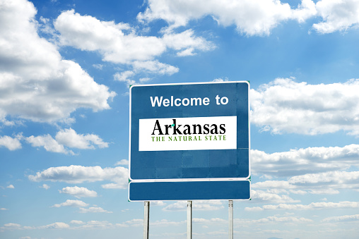Arkansas  welcome road sign