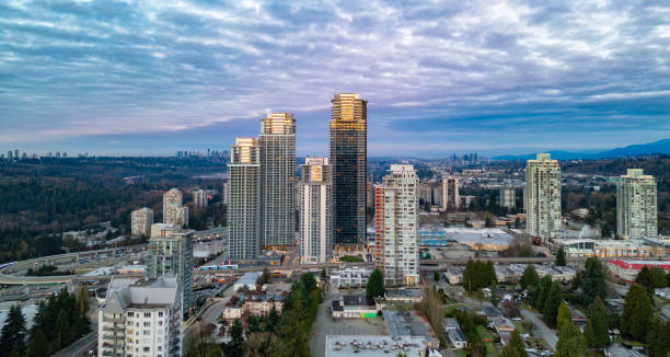 istock Aerial view of a modern downtown skyline under a cloudy sky 2027162716