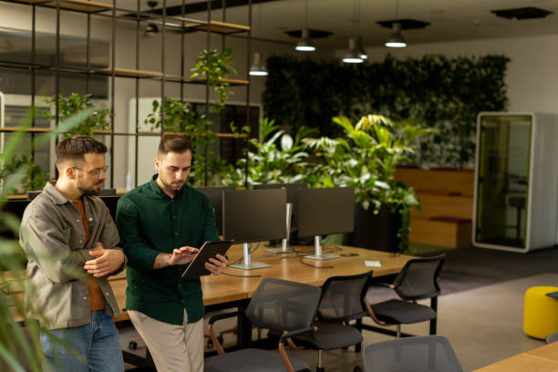 Collaborative Discussion in a Modern Office With Exposed Brick Walls