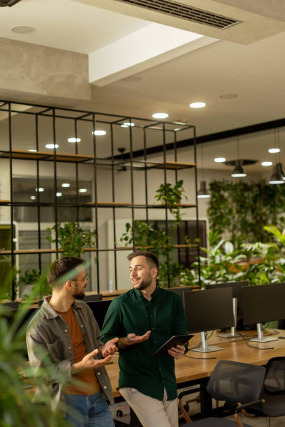 istock Collaborative Discussion in a Modern Office With Exposed Brick Walls 2027163239