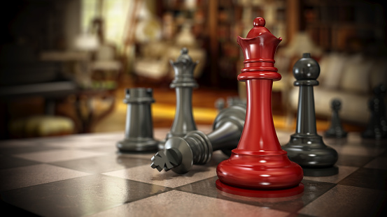 Red and black chess pieces on the chessboard. Choice and desicions concept.
