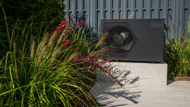 istock Outdoor heat pump unit for heating a swimming pool. 2027176505