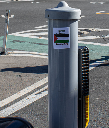 nyc, United States – February 08, 2024: A Palestine flag sticker on a street pole for protest design in New York, United States