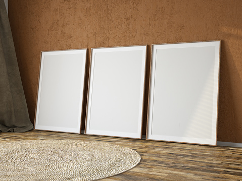 Three Empty Mock up Picture Frame Against Beige Wall. 3D Render