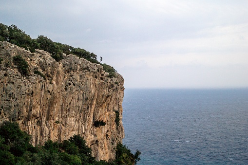 High Cliff Overlooking Blue Mediterranean Sea, Spectacular Views for Adventure. Kemer, Turkey