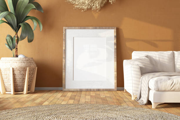istock Empty Picture Frame Against Beige Wall in a Cozy Living Room 2027211705
