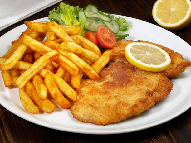 istock Breaded Schnitzel with French Fries; Meat specialty 2027218621