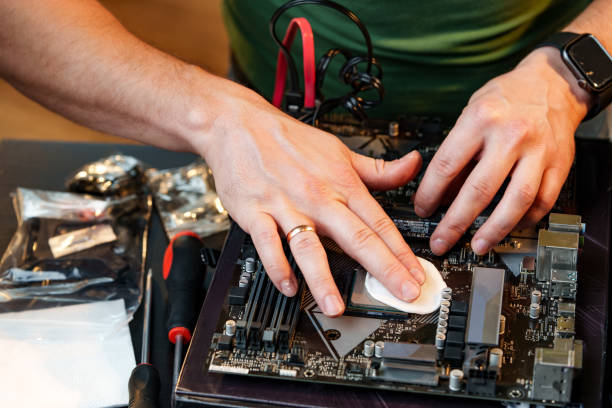 istock Close up of man repairing computer system unit 2027232474