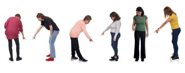 istock group of women pointing down on white background 2027235115