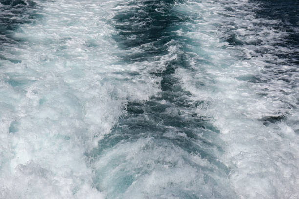 sea background with sailing waves and white foam