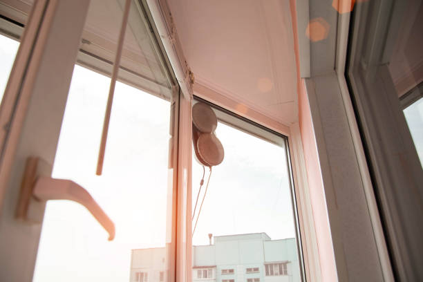 istock Automatic vacuum robot window washer washes glass from dirt. Modern technology and security Copy space for text 2027259481
