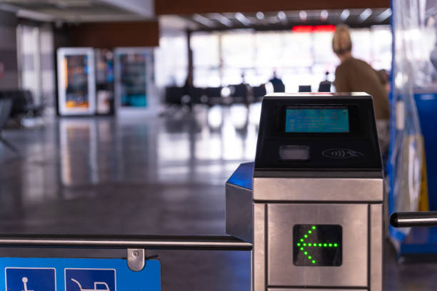 istock Turnstile is a close-up with a green arrow. Control and security. Pass through the passes. Turnstiles in the subway, on the piers. 2027278384