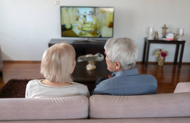 istock Senior Couple Watching TV 2027298354