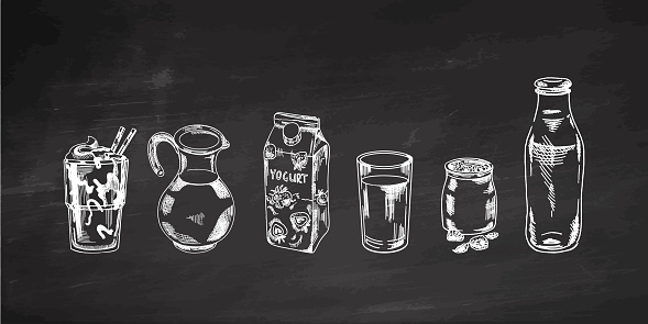 A set of hand-drawn sketches of milk drinks isolated on chalkboard background. Vector illustration in vintage style. Beverages. Good for the menu.