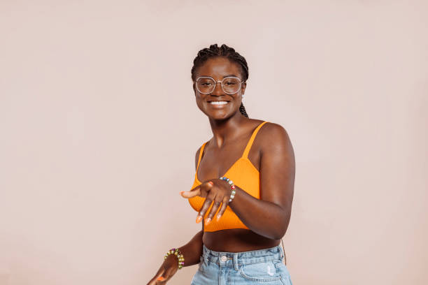istock Young african woman pointing finger at camera 2027308980