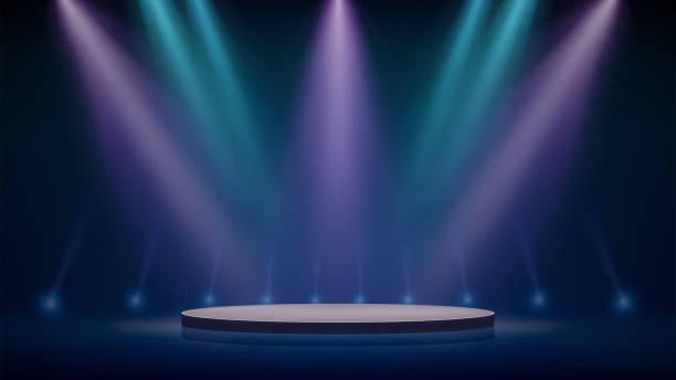 istock Stage, blue pink purple spotlights, podium. Background, backdrop for displaying products. Blue pink stage spotlight on dark background. Beams of spotlights, glittering particles, a spot light. Vector 2027329122