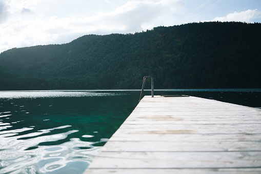 Wooden jetty on the mountain lake