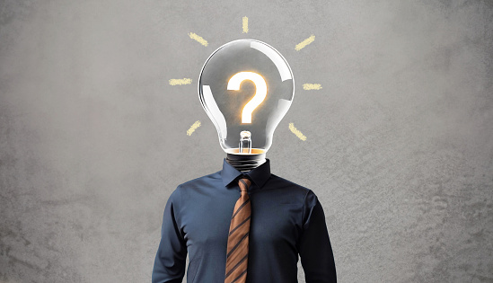 Creative idea or problem solving concept. Light bulb and question mark instead of a businessman head.