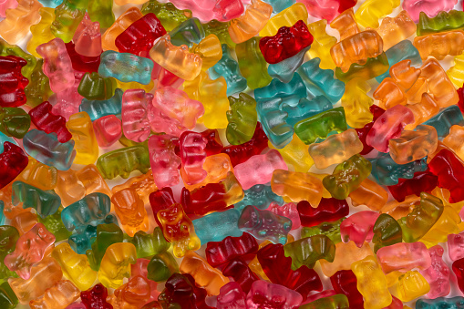 Colorful Gummibears Texture Background: A Sweet Symphony of Flavors annd Colors.