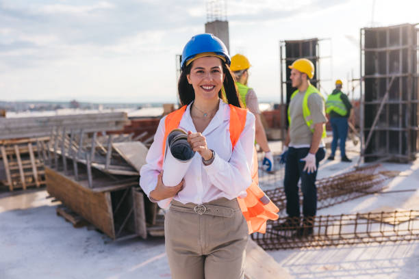 istock Portrait of a female construction worker on a construction site 2027429527