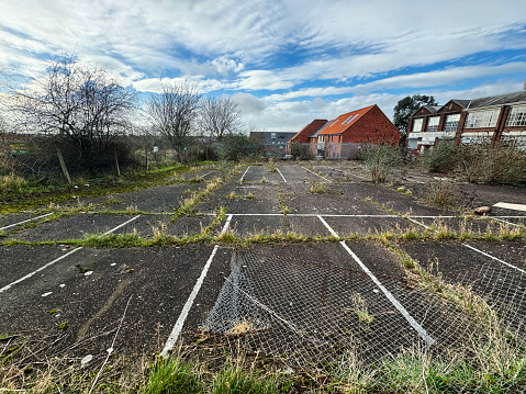 Overgrown unused car park