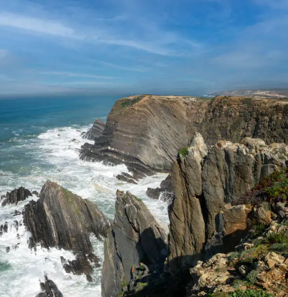 Mesmerizing cliffs and rocky outcrops on the Atlantic ocean coast of Alentejo. Cabo SardÃ£o, Ponta do Cavaleiro, Odemira, Bejo, Alentejo, Portugal