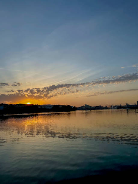 istock Sunset over the lake in the city 2027501552