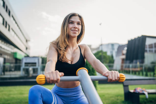 istock Fit woman exercising in outdoors gym 2027516011
