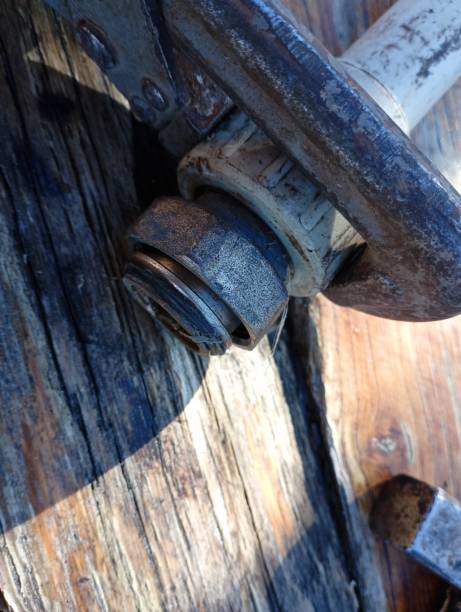 istock Repair of the water supply system using a large spanner. The plastic pipe is clamped with a key. 2027520432