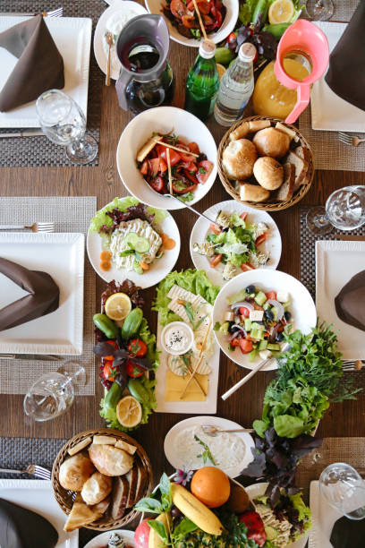 A table covered with a variety of delectable dishes, featuring mouthwatering food arrangements.